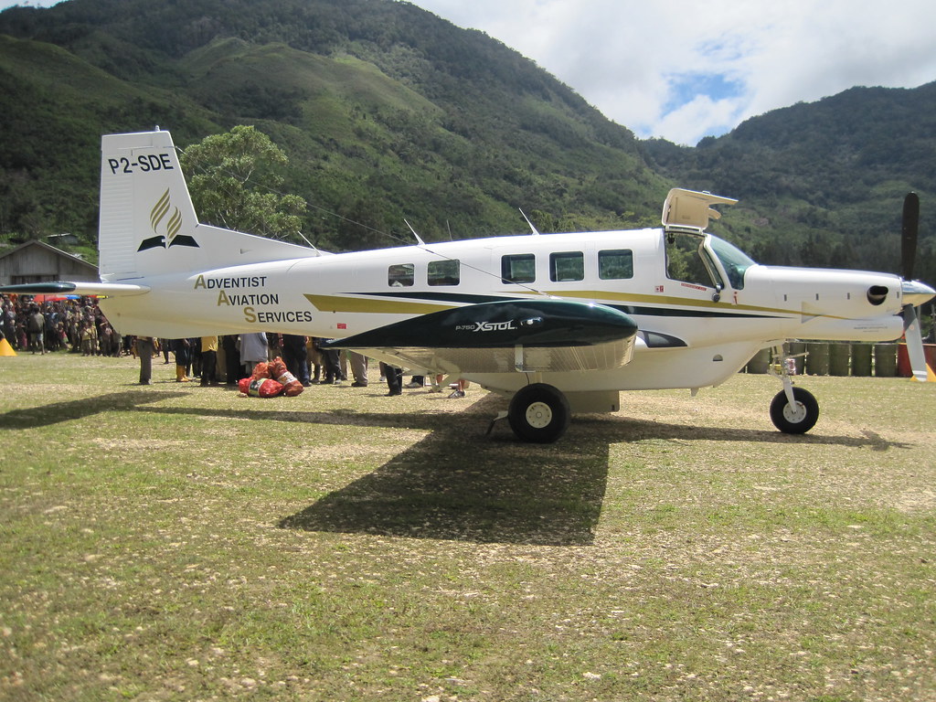 AAS plane on grass runway